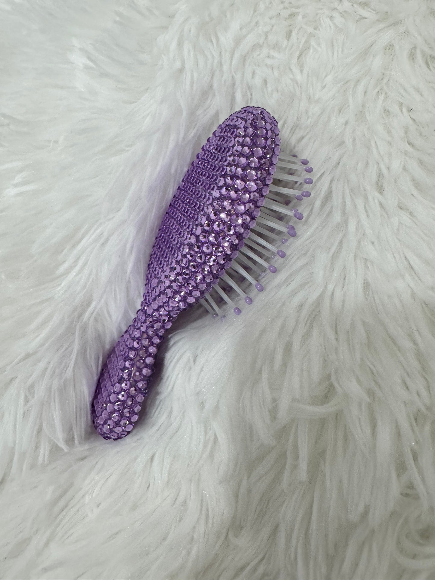 Purple hair brush