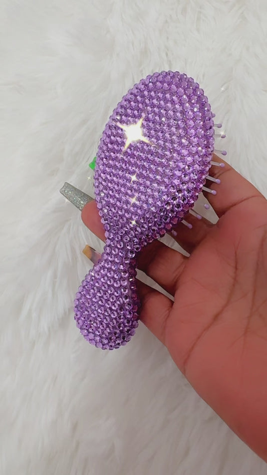 Purple hair brush